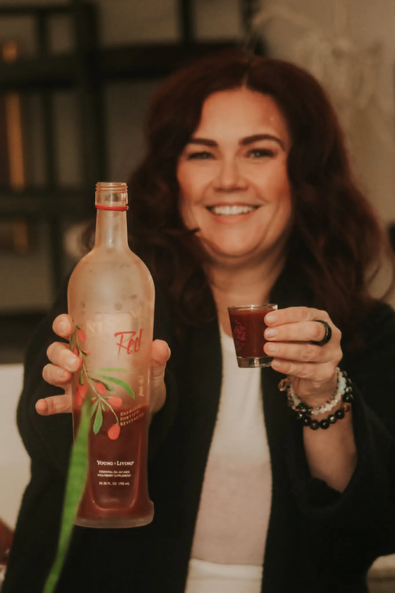 Melissa Anne holding NingXia Red bottle