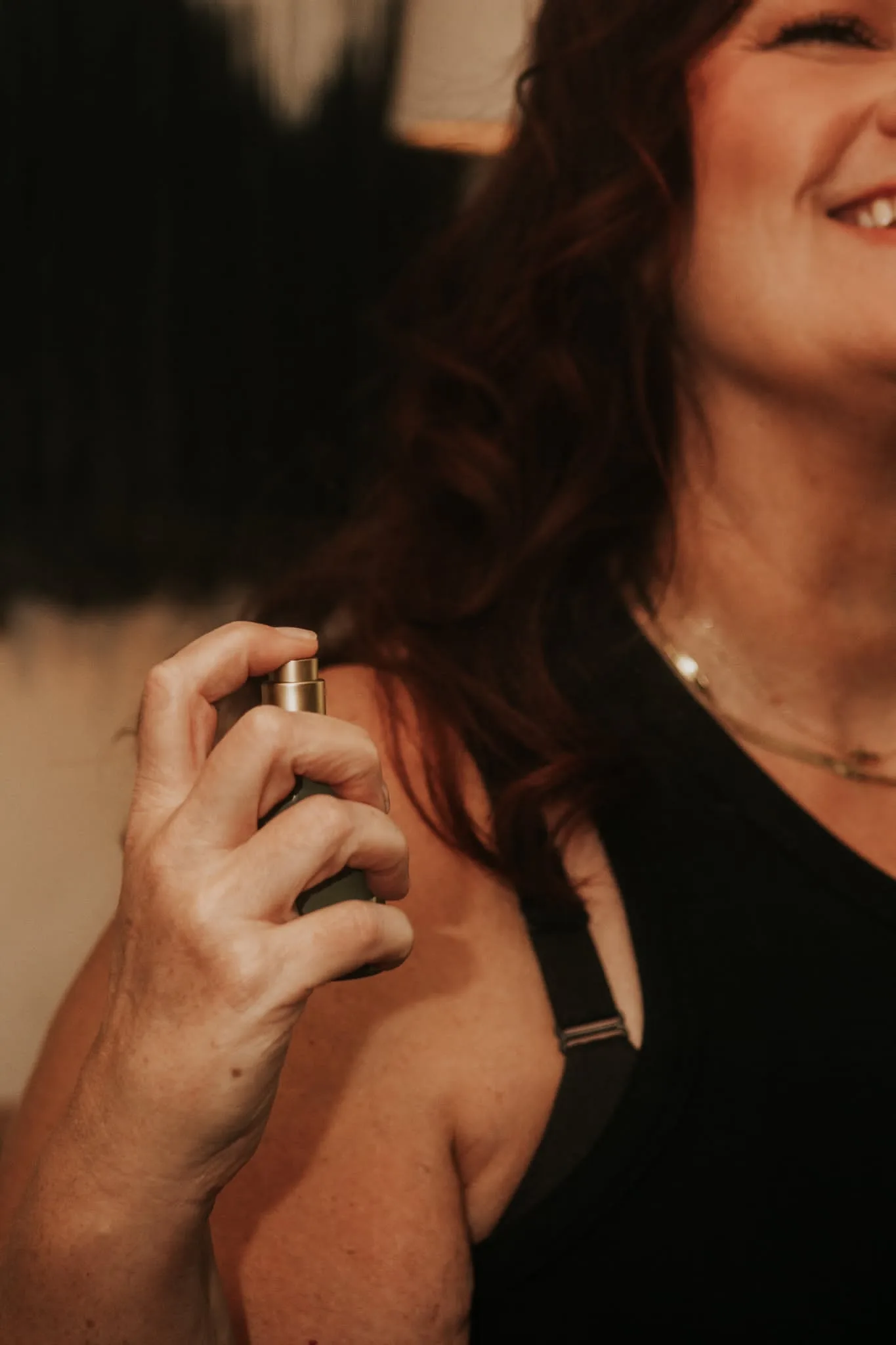 Melissa Anne with essential oil bottles